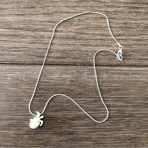 Serling Sliver sea turtle hatching from egg necklace